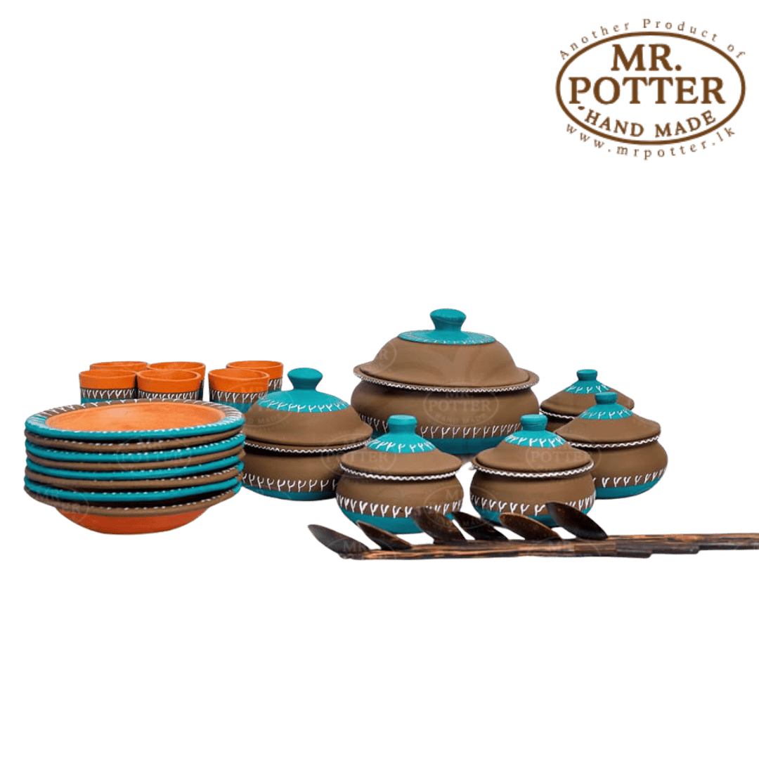 Handmade ceramic cookware set with colorful lids and utensils from Mr. Potter Sri Lanka.